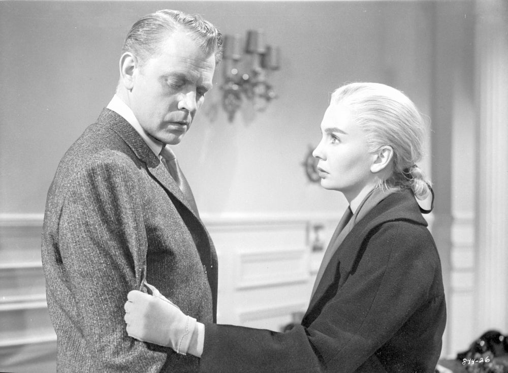 Home Before Dark Lady Touching Man's Coat Photo Print