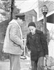Home Before Man in Coat Talking to a Man Photo Print