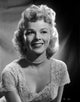 Sally Forrest smiling portrait photo print with embroidered top
