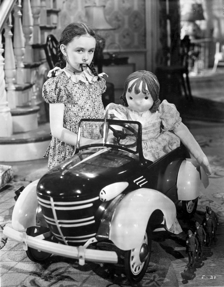 Kid with a Toy Car and Doll Portrait Photo Print