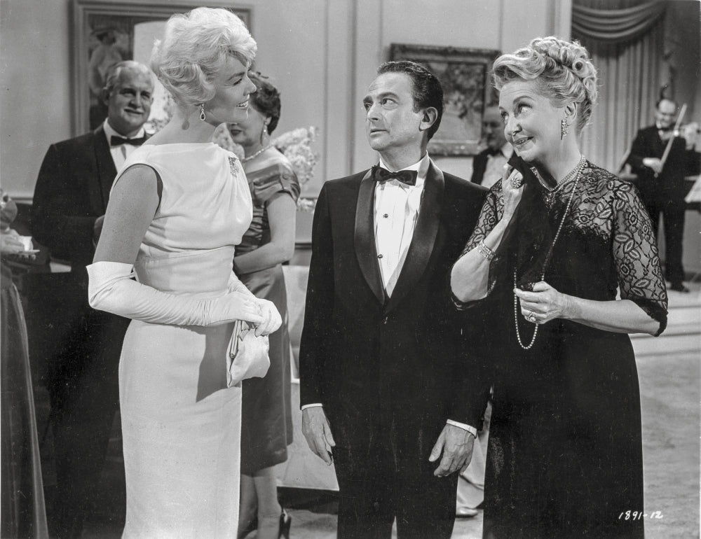 Pillow Talk scene photo print of people in formal outfits engaged in conversation.