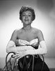 Elegant photo print of Rita Hayworth in gown on chair