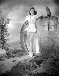 Carol Forman standing portrait photo print with hand on side, midriff pose.