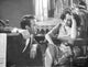 Black and white photo print of Suddenly Last Summer film scene featuring a couple in serious conversation.