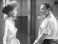 Suddenly Last Summer black and white photo print of lady talking with man scene.