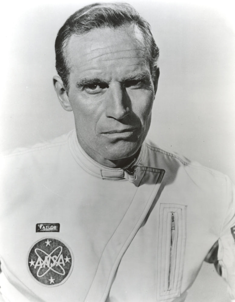 Charlton Heston posed in white NASA uniform photo print