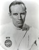 Charlton Heston posed in white NASA uniform photo print