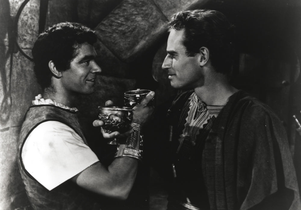 Charlton Heston photo print featuring a man holding a cup