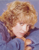 Catherine Hicks wearing a big hat photo print