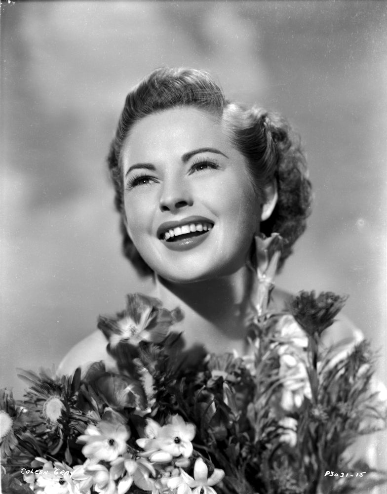 Colleen Gray Surrounded with Flowers Portrait Photo Print