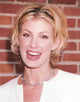 Faith Hill smiling photo print with red background