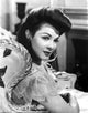 Kathryn Grayson photo print sitting on a chair in a lace top, vintage Hollywood art.