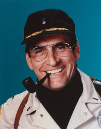 Member of Hill Street Blues photo print featuring character with pipe and black hat.
