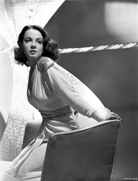 Kathryn Grayson sitting on a couch photo print