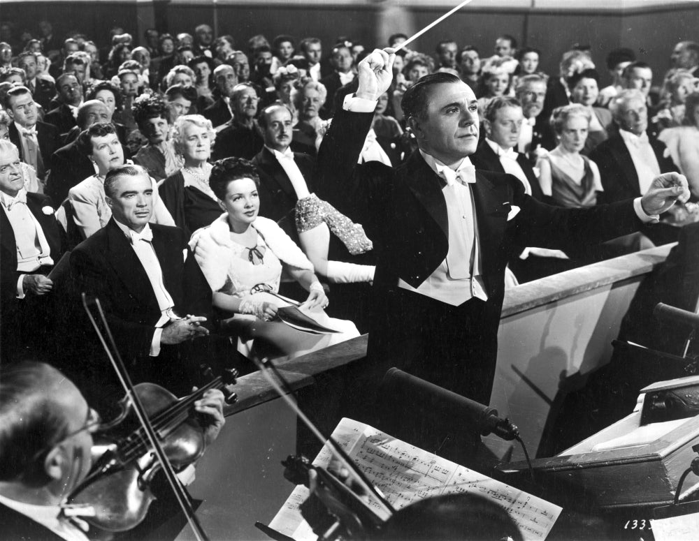 Film still photo print of Kathryn Grayson in an audience.