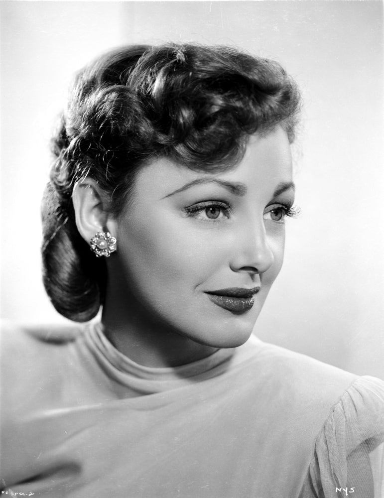 Virginia Grey smiling in a dress photo print capturing vintage elegance.