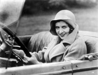 Portrait of Dorothy Gulliver driving a car photo print.
