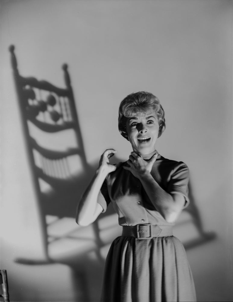 Black and white portrait photo print of Psycho cast member choking herself.