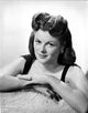 Barbara Hale Leaning Portrait Photo Print showcasing classic Hollywood elegance.