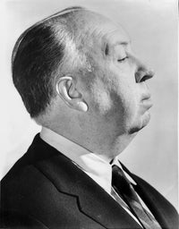 Alfred Hitchcock side view pose photo print in suit and tie.
