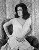 Linda Harrison Photo Print featuring leopard background