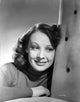 Signe Hasso smiling portrait photo print leaning on a couch