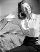 Anne Baxter smiling photo print, classic Hollywood portrait.