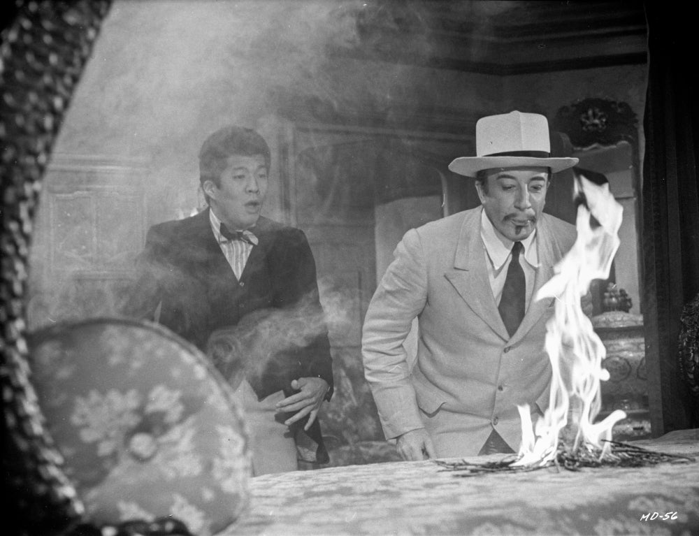 Murder by Death movie scene photo print showcasing classic cinema.
