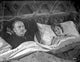 Photo print of a scene from the classic film Murder by Death, available in various sizes.