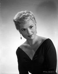 Judy Holliday portrait photo print in a V-neck dress with earrings.