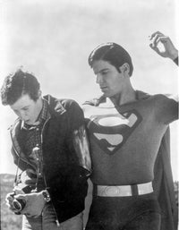 A Scene From Superman Photo Print showcasing iconic superhero action.