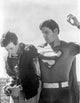 A Scene From Superman Photo Print showcasing iconic superhero action.