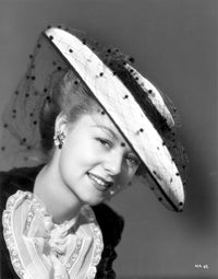 Jennifer Holt on a Hat Photo Print showcasing colorful design.