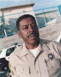 Ernie Hudson in police uniform photo print