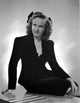 Kim Hunter Long Sleeve Sitting on a Table Photo Print