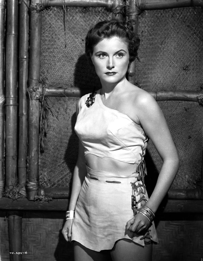 Virginia Huston in a midriff top and short skirt photo print.