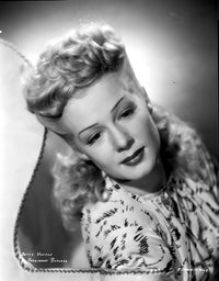 Betty Hutton portrait photo print showcasing her charm in a printed dress.