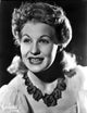 Betty Hutton leaning with a flower portrait photo print, classic Hollywood art.