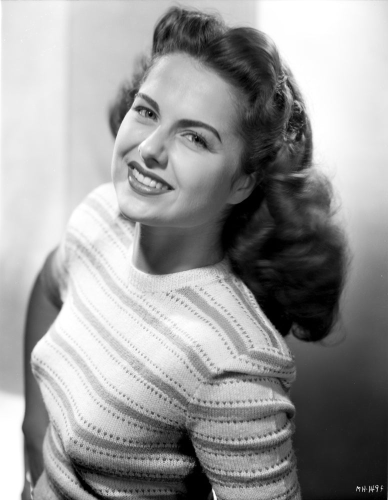 Martha Hyer smiling photo print in a stylish printed top.