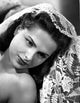 Martha Hyer on an embroidered veil photo print showcasing classic Hollywood elegance.