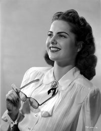 Martha Hyer smiling photo print in a long sleeve top, showcasing classic Hollywood charm.