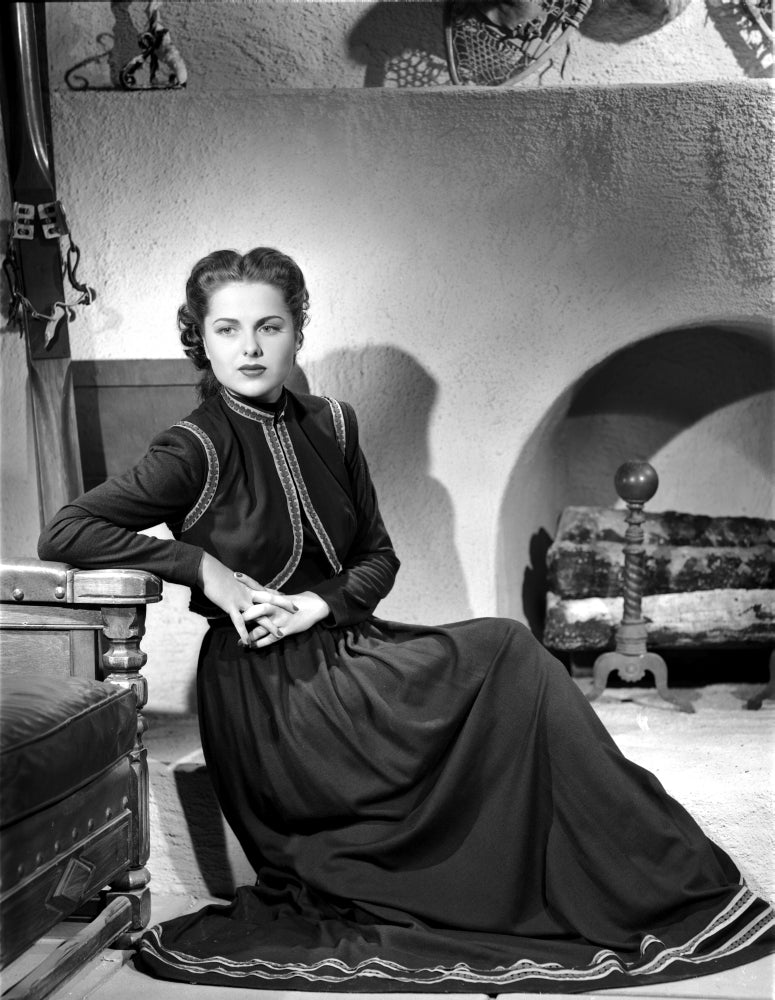 Martha Hyer elegant photo print in dark long sleeve gown.