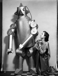 Lois January Kneeling Before the Robot photo print, available in multiple sizes.