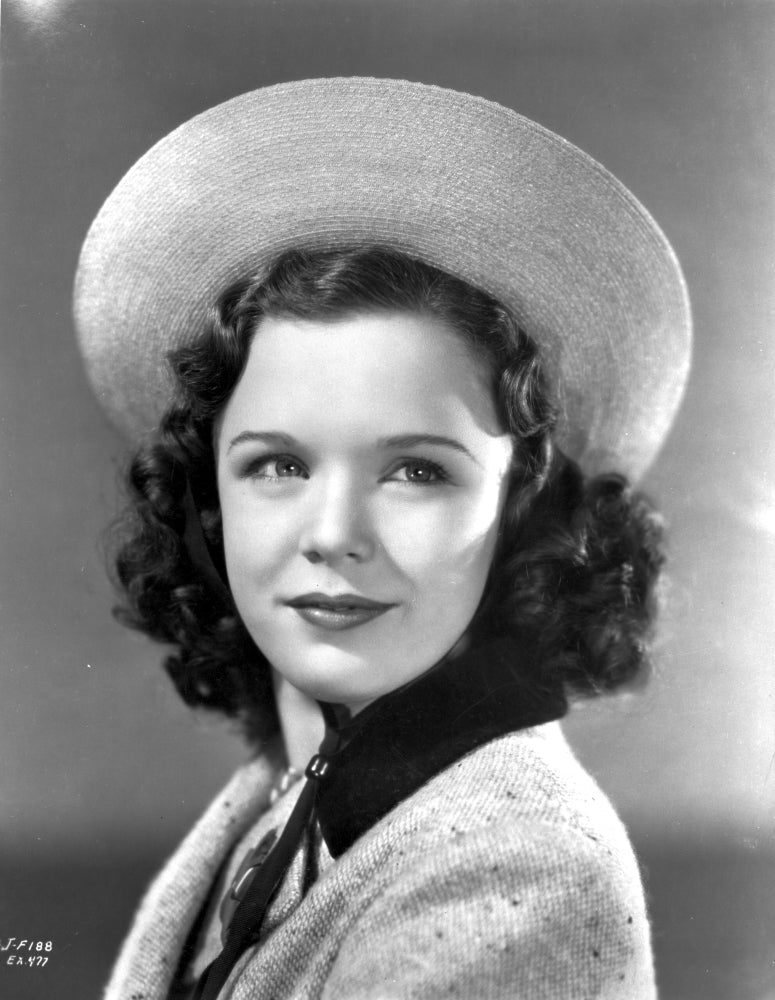 Gloria Jean smiling photo print in stylish hat