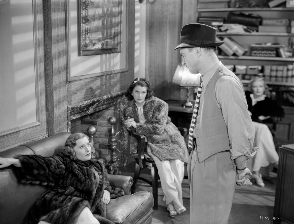 A Scene from The Mad Miss Manton Photo Print showcasing classic cinema.