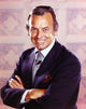 David Janssen smiling portrait photo print in formal suit.