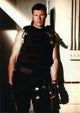 Brad Johnson posed in a black suit photo print