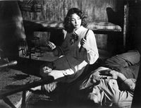 Jennifer Jones sitting photo print showcasing elegance and charm.