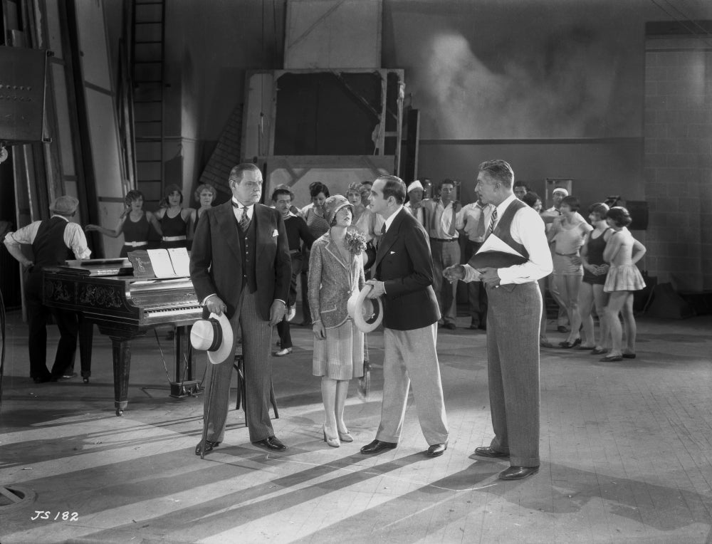 Al Jolson discussing in a group inside the studio - classic movie scene photo print