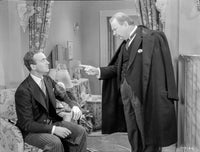 A scene from the classic film Bachelor Mother, photo print available in multiple sizes.